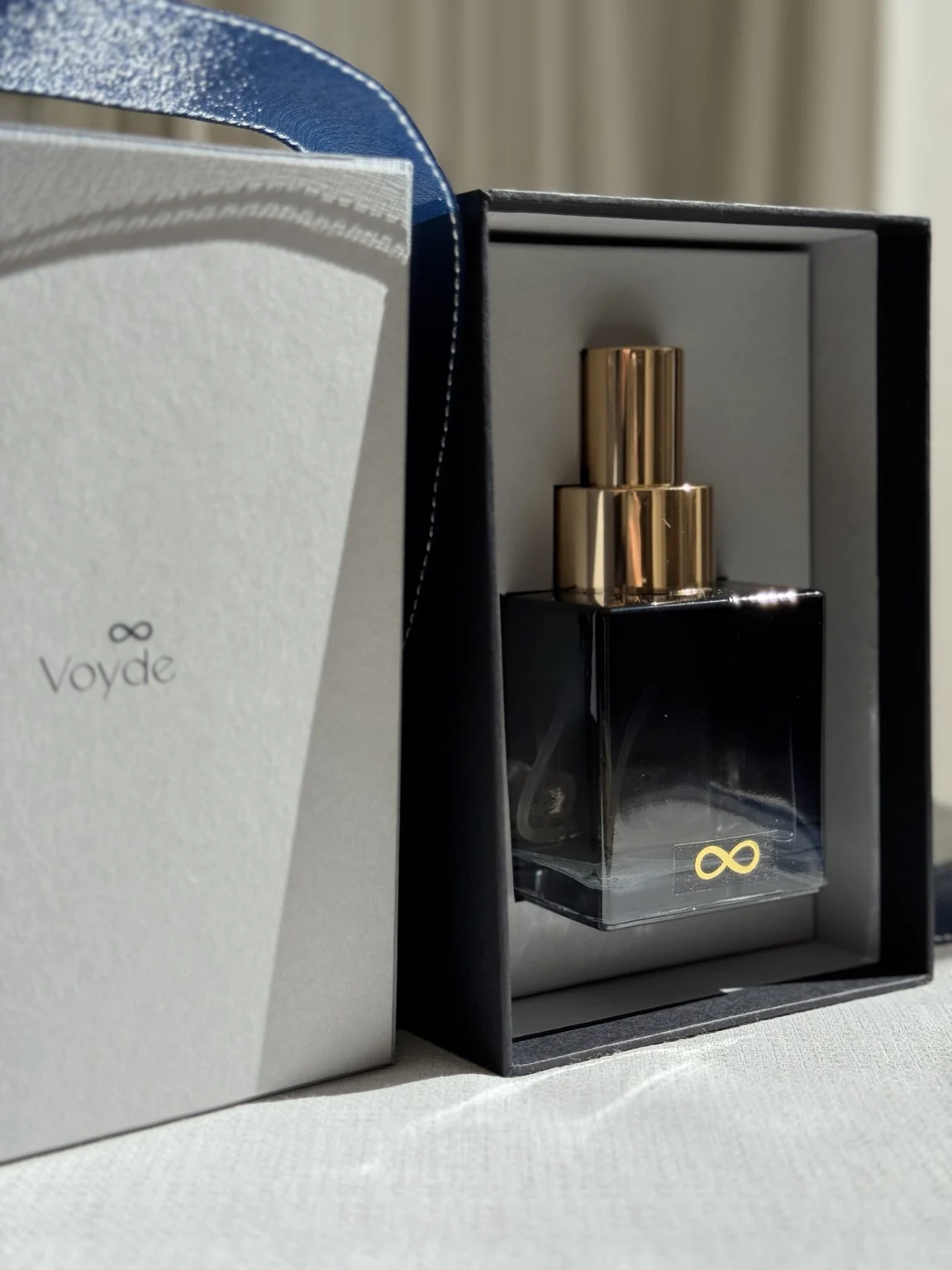 Open Voyde Wellbeing Bespoke Atelier box with personal fragrance bottle
